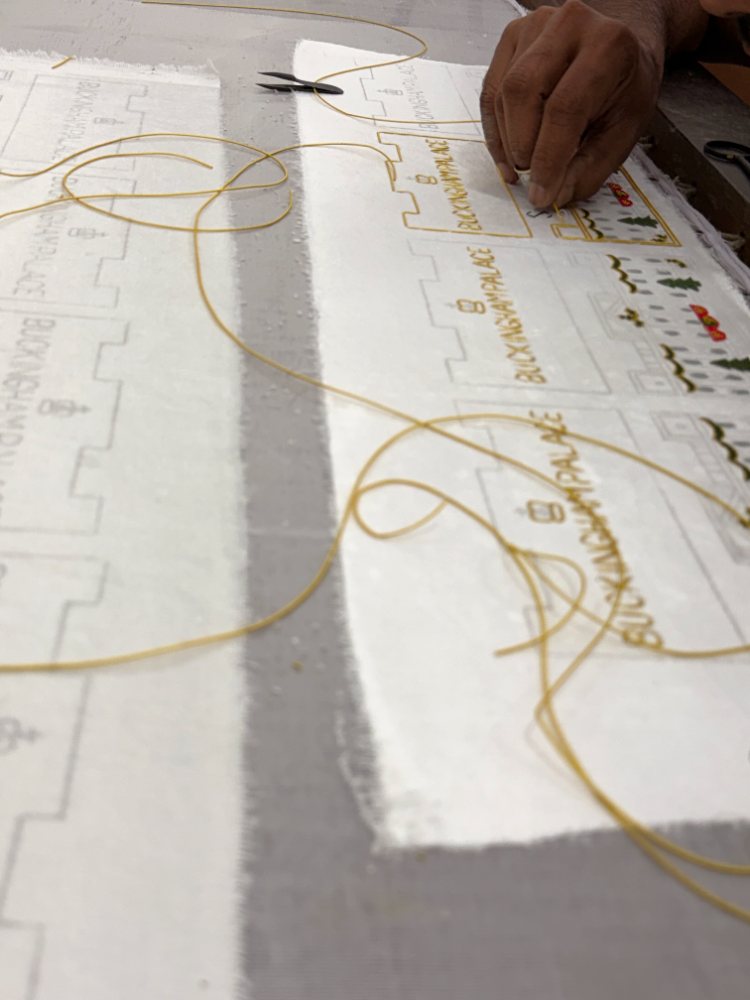 The finished bullion panel in gold, red and green