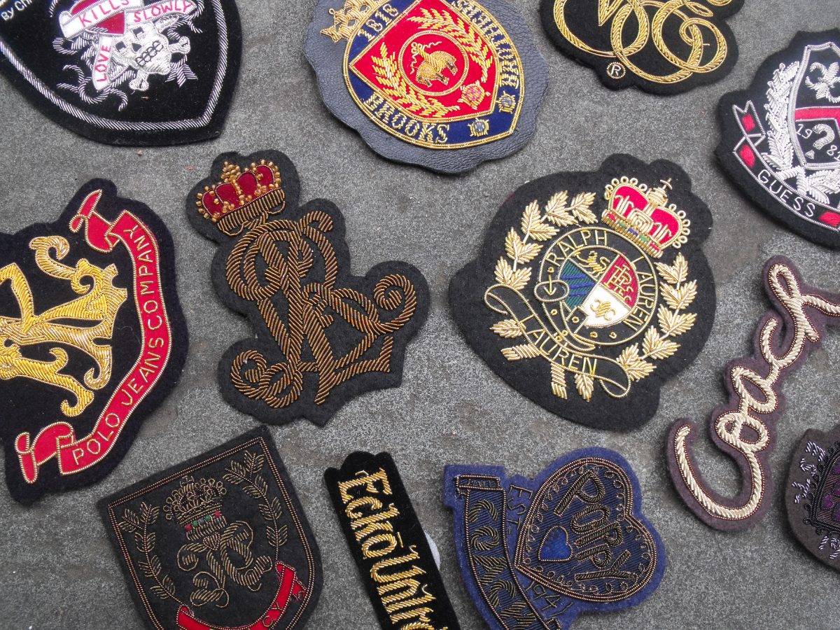 Bullion crests and monograms made for fashion house garments